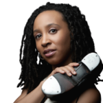 Head shot photo of Annette Walker with tap shoe